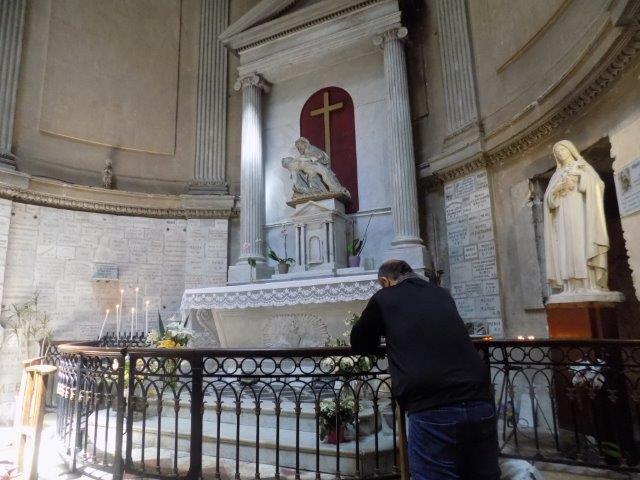 Praying at the Church in L'lle Bouchard