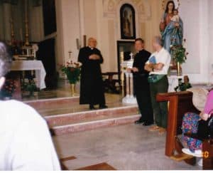 Msgr Giuseppe Amato meeting with a group of pilgrims