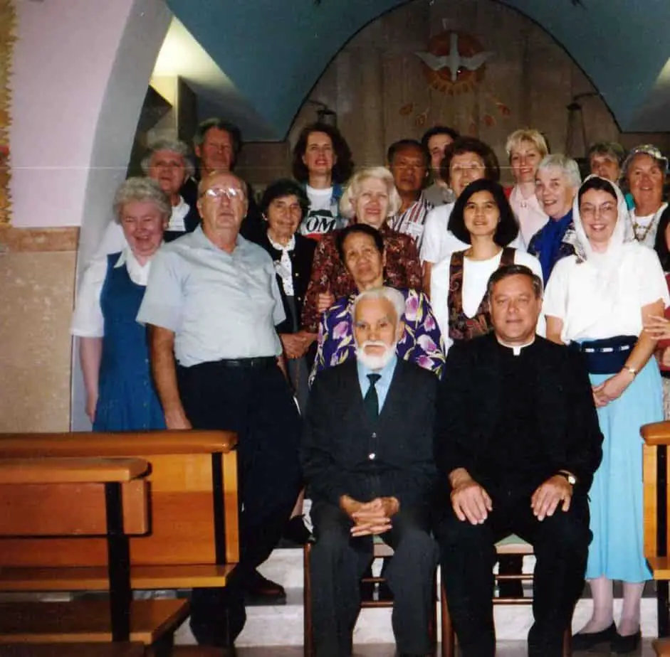 Picture of Bruno (seated) with a group of pilgrims in 1995