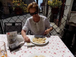 Independent travelers get to stop whenever & wherever they want to sample local cuisine...here is an example of eating Pierogies in Poland