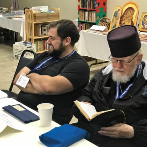 Father Joseph and Aiden Doyle at the Northwest Catholic Homeschoolers Conference in Seattle, WA.