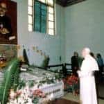 Pope John Paul II visiting his tomb (photo courtesy The Catholic Company)