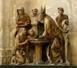Statue of the baptism of St. Augustine in Troyes Cathedral