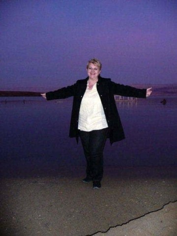 Edita Krunic, president of Select International Tours, on the Sea of Galilee