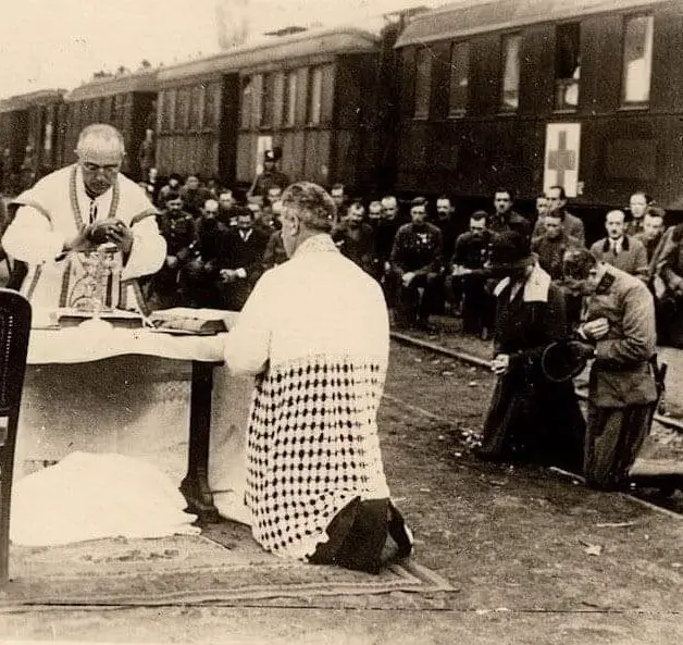 Emperor Karl of Austria & wife Zita at an outdoor Mass in 1921