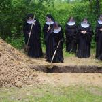 Fellow sisters digging the grave of Mother Wilhelmina Lancaster