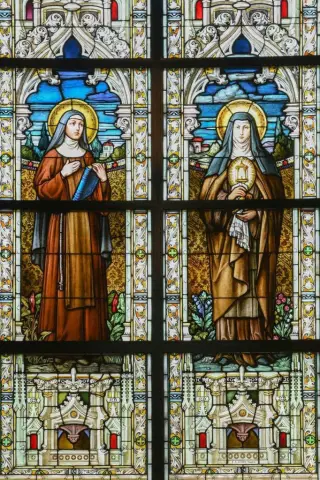 Closeup of the stained glass windows at st clare catholic church in charleston, sc