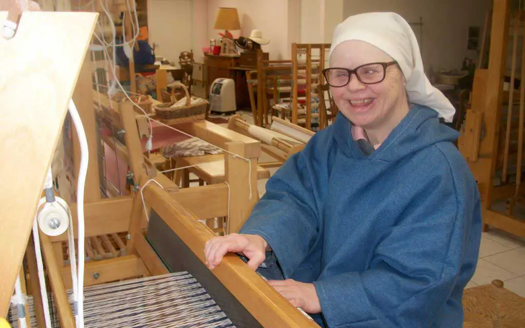 Down syndrome Sister Weaving one of the Sisters of the Little Sisters Disciples of the Lamb