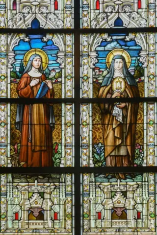 Windows depicting St Clare in the Catholic church of St Clare in Charleston, South carolina